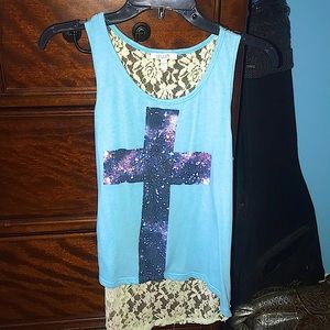 Blue tank top, with cross design.